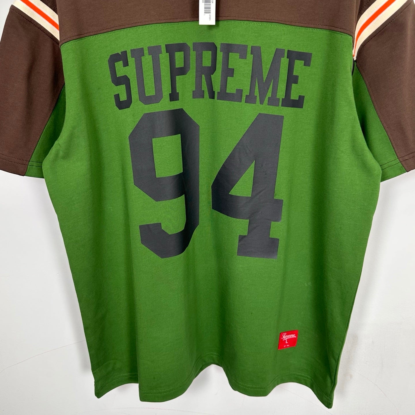 SUP s/s football top