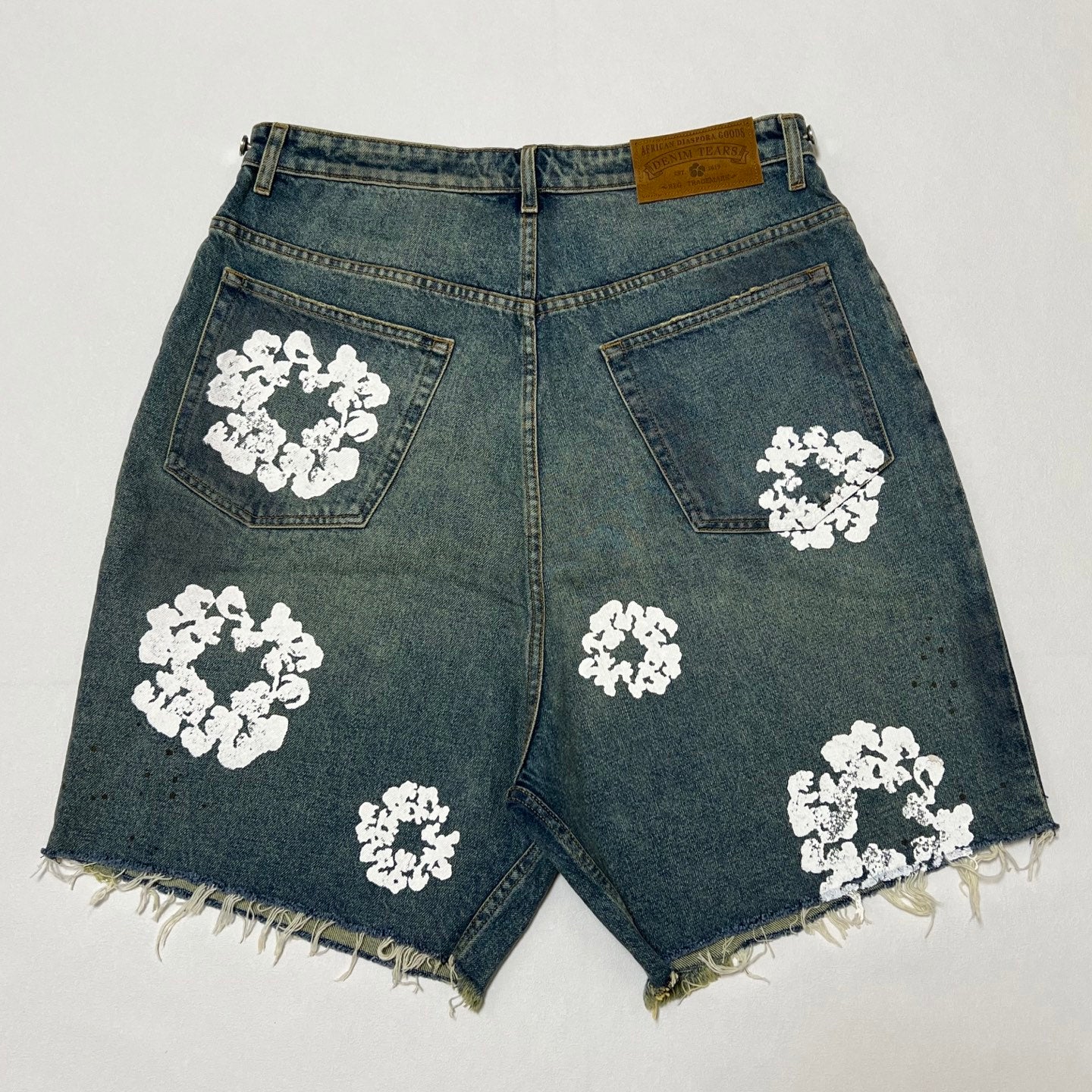 Denim Tears ripped denim shorts
