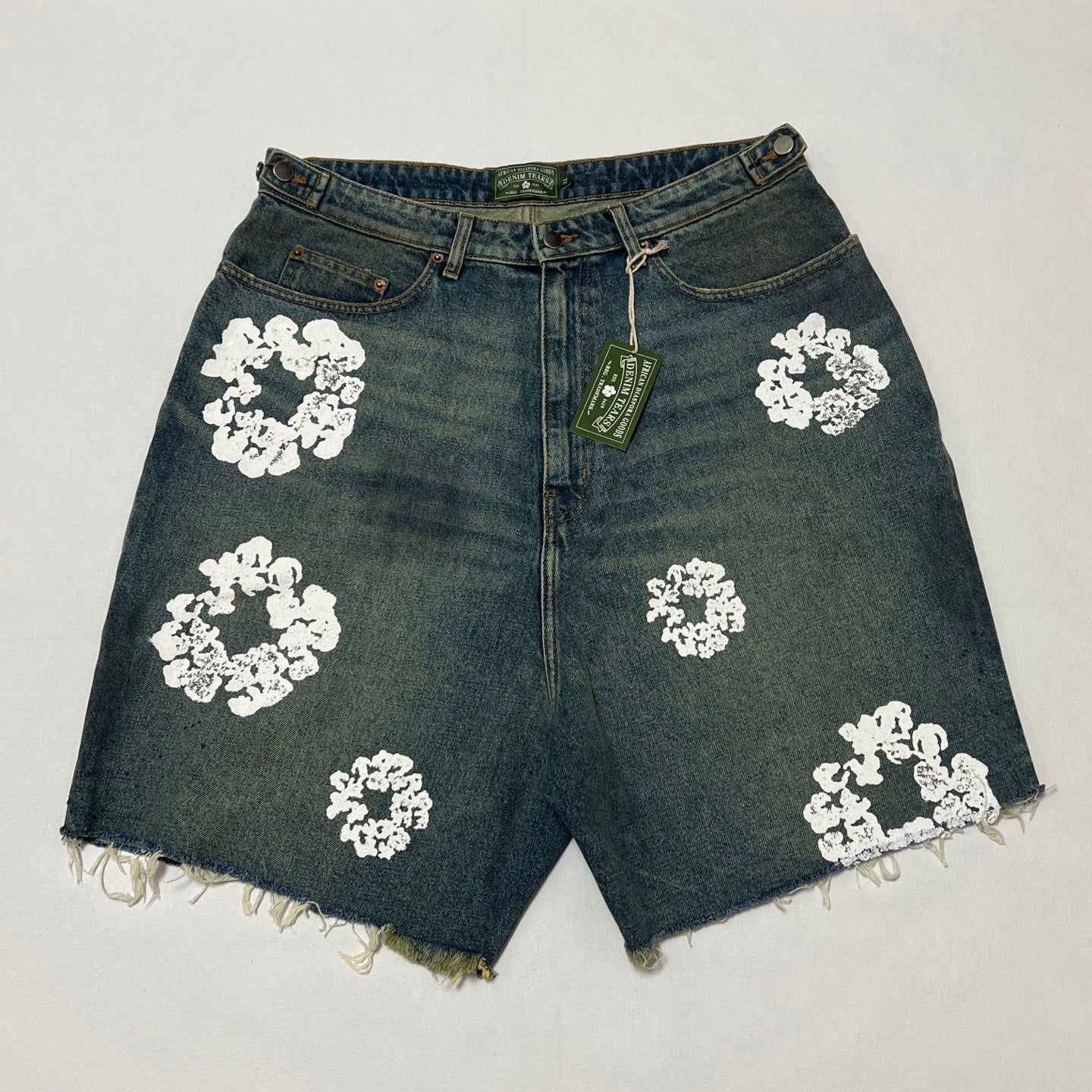 Denim Tears ripped denim shorts