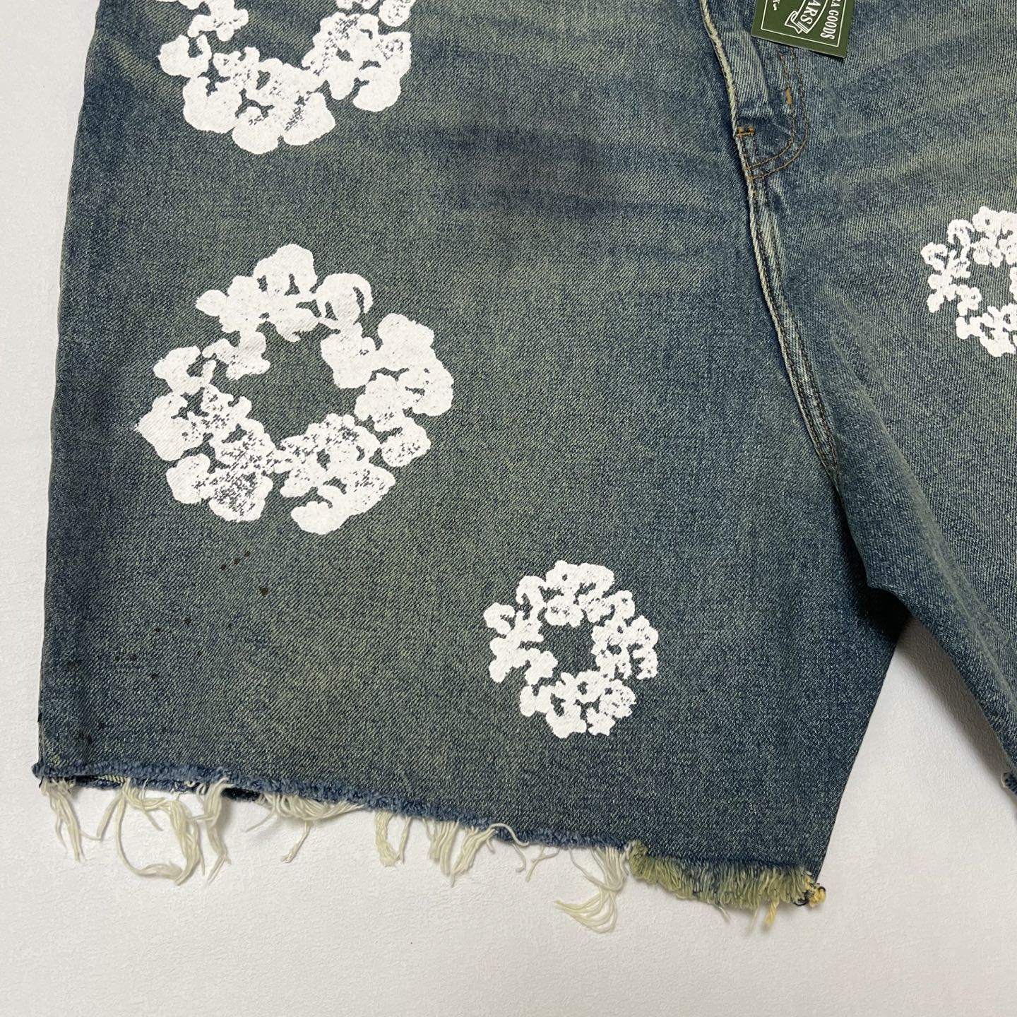 Denim Tears ripped denim shorts