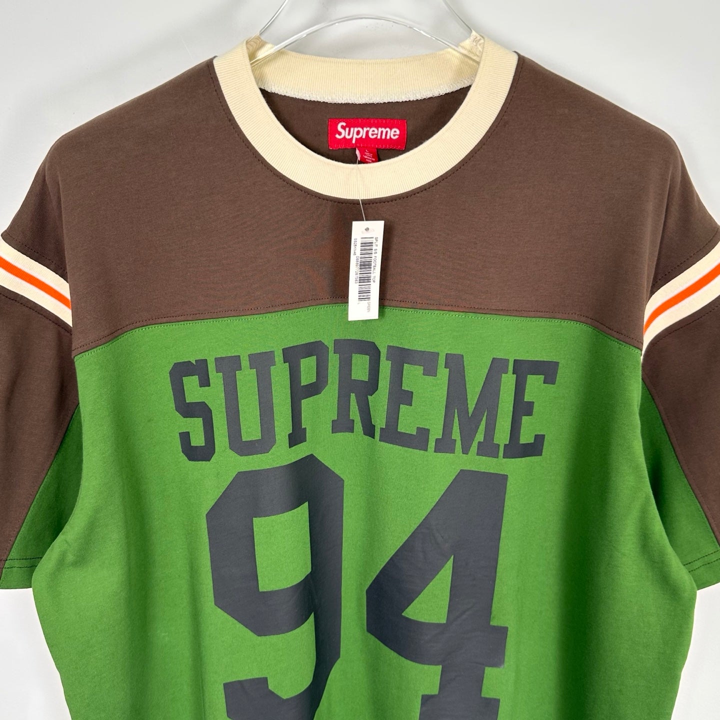 SUP s/s football top