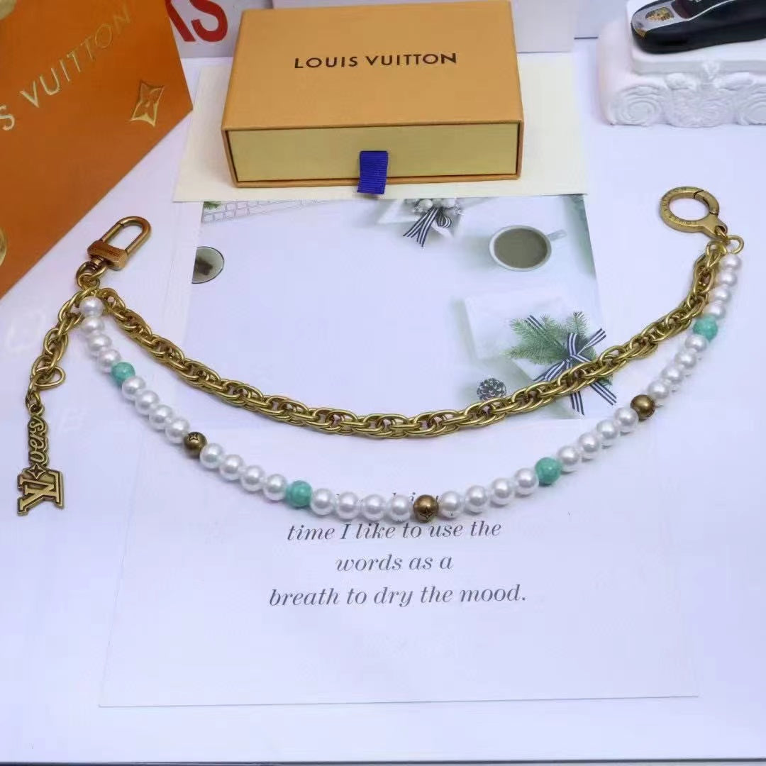 LV belt and bag charm multicolor