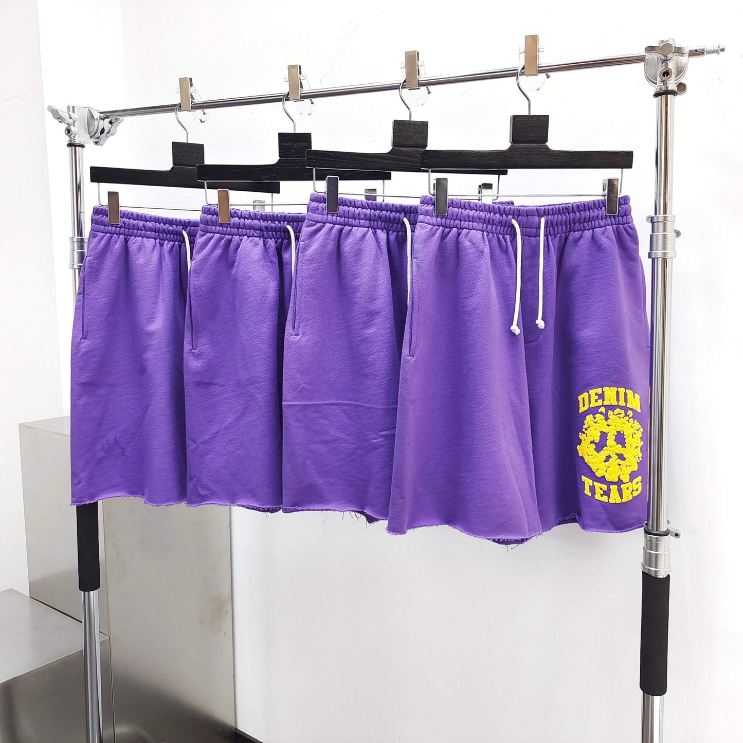 Denim tears university sweat shorts purple