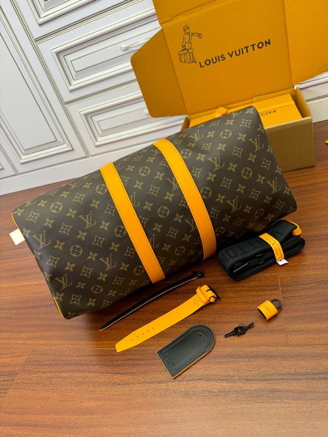LV Keepall Bandouliere 55 M46702