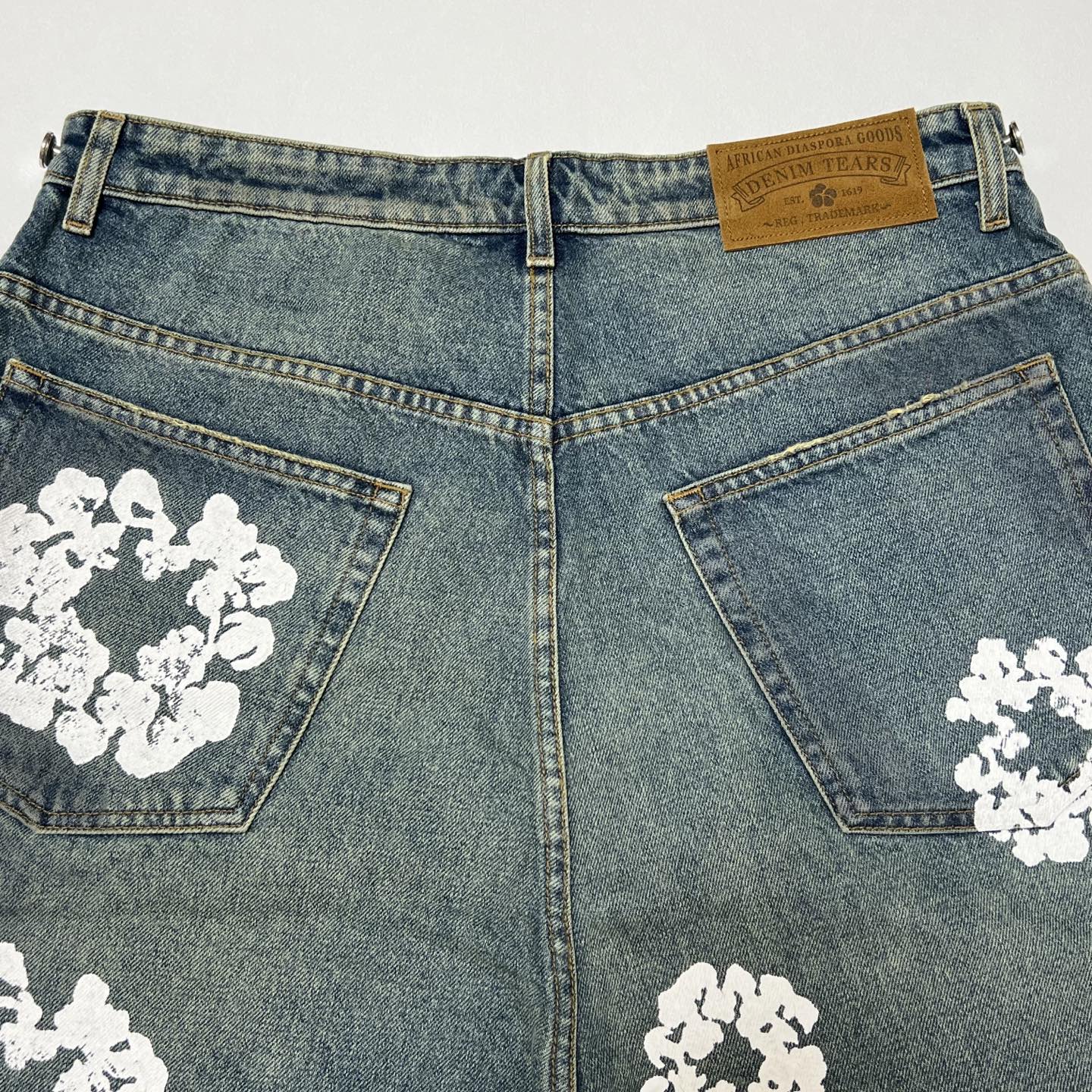 Denim Tears ripped denim shorts