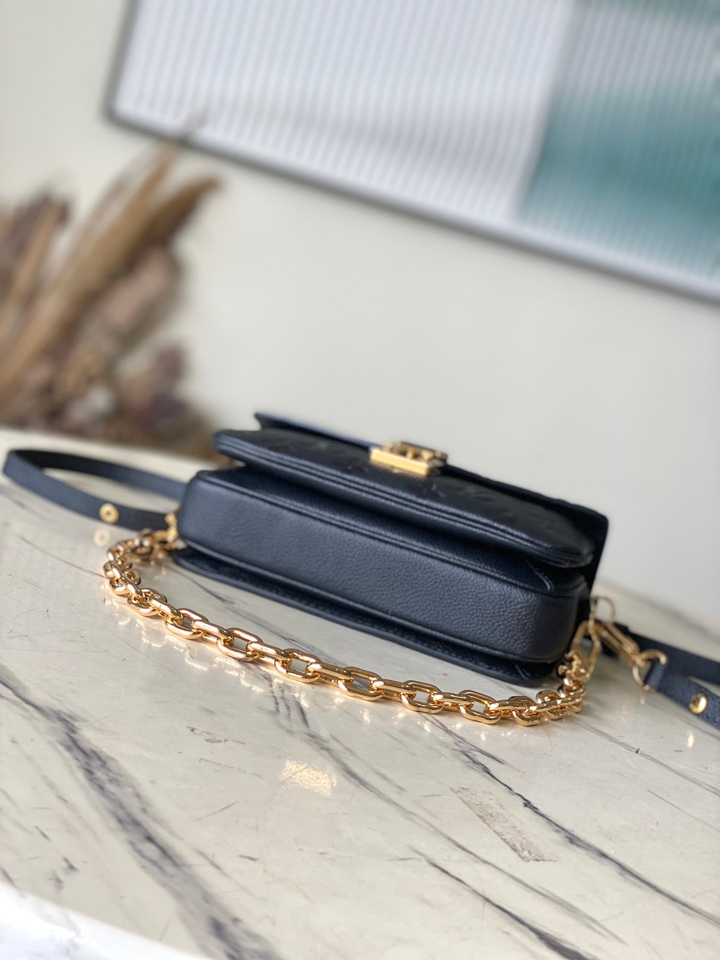 LV Pochette Métis East West M46595