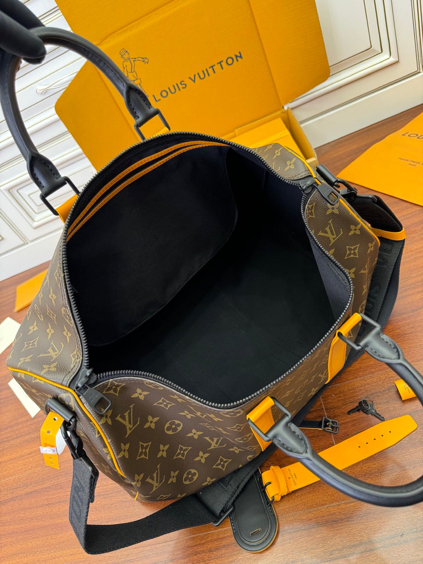 LV Keepall Bandouliere 55 M46702
