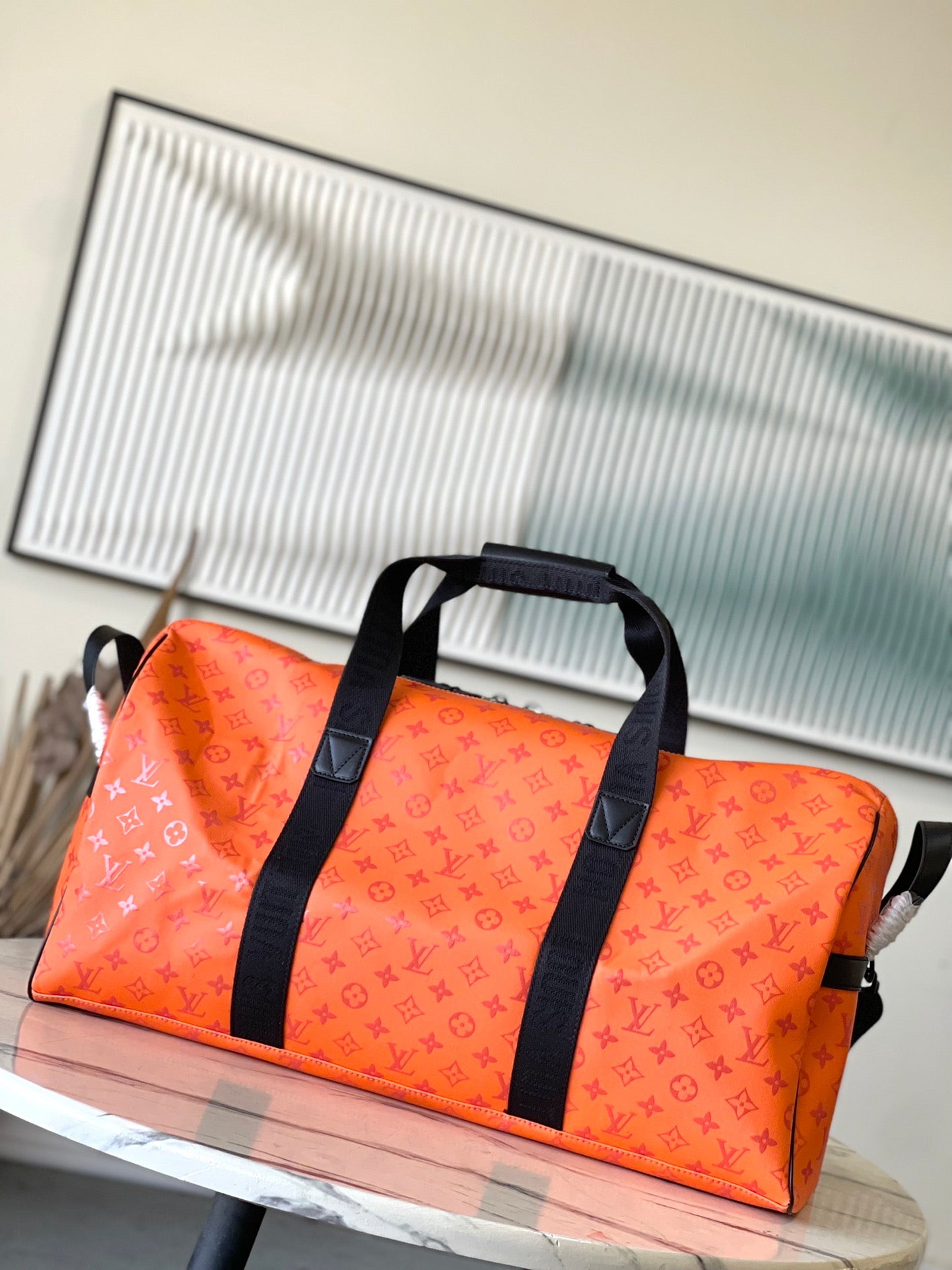 LV Keepall Sport M12724