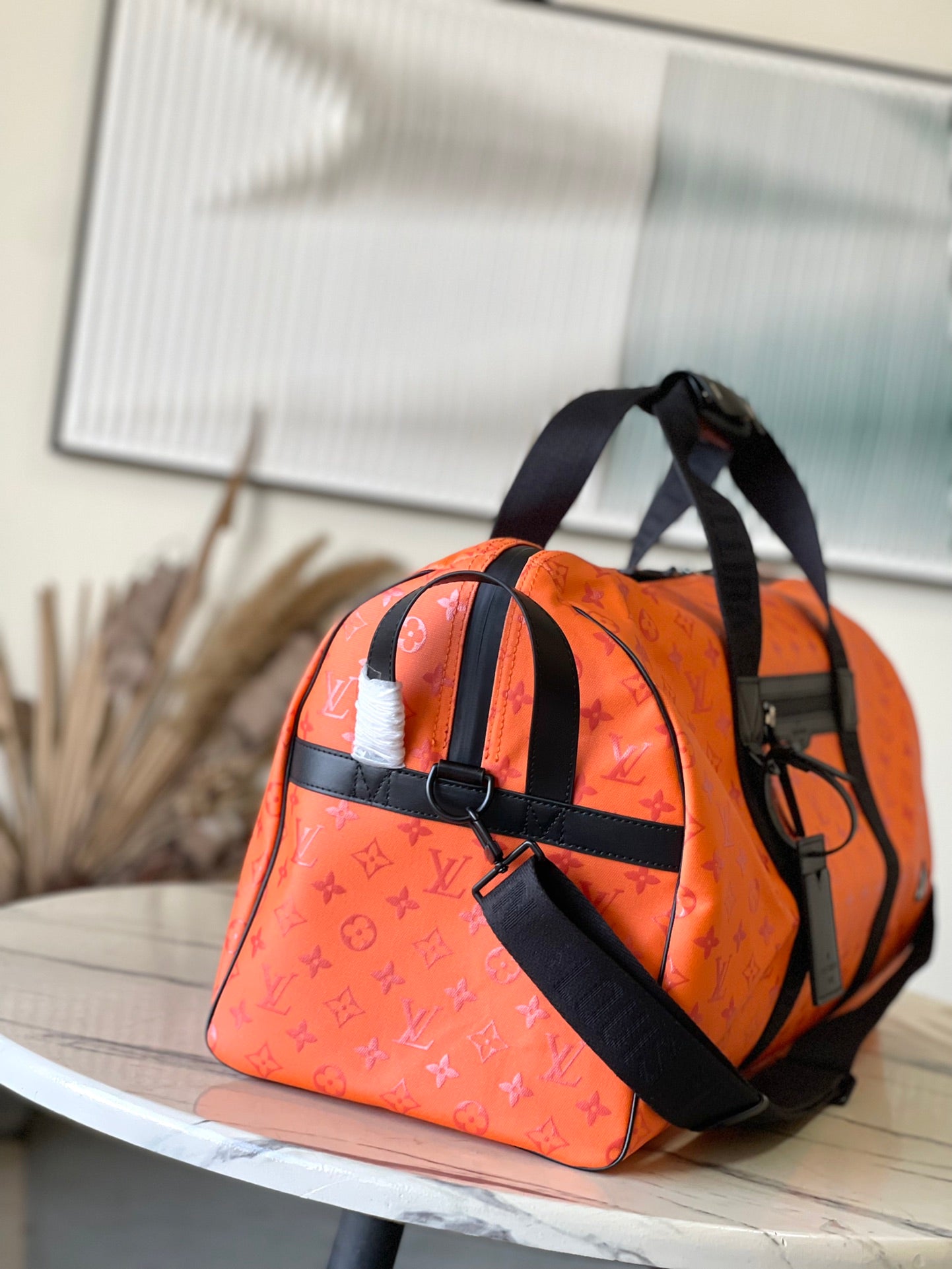 LV Keepall Sport M12724