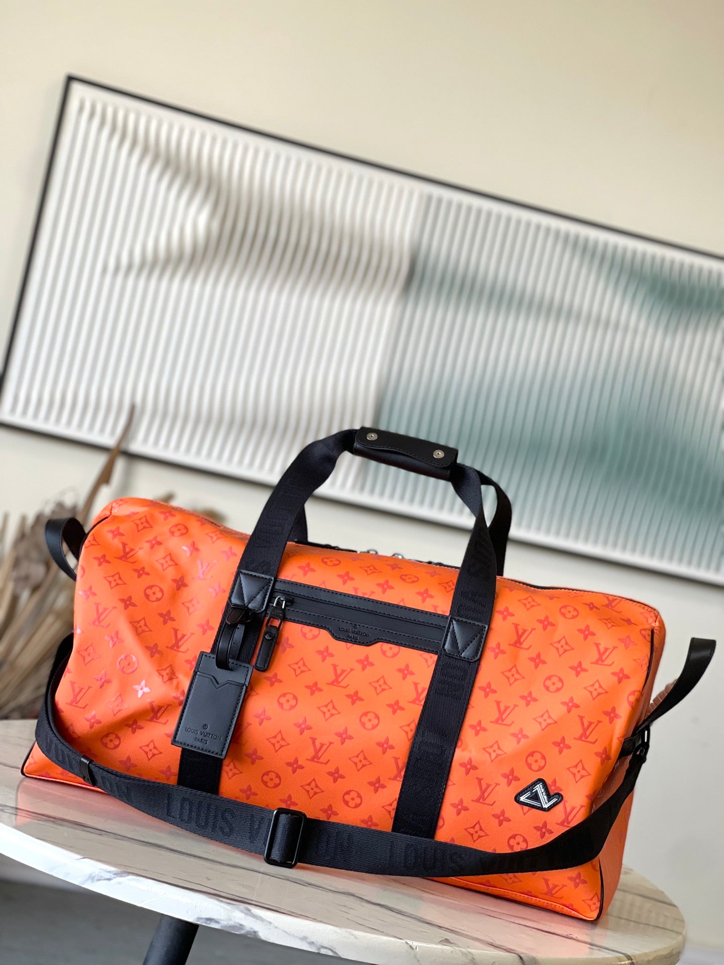 LV Keepall Sport M12724
