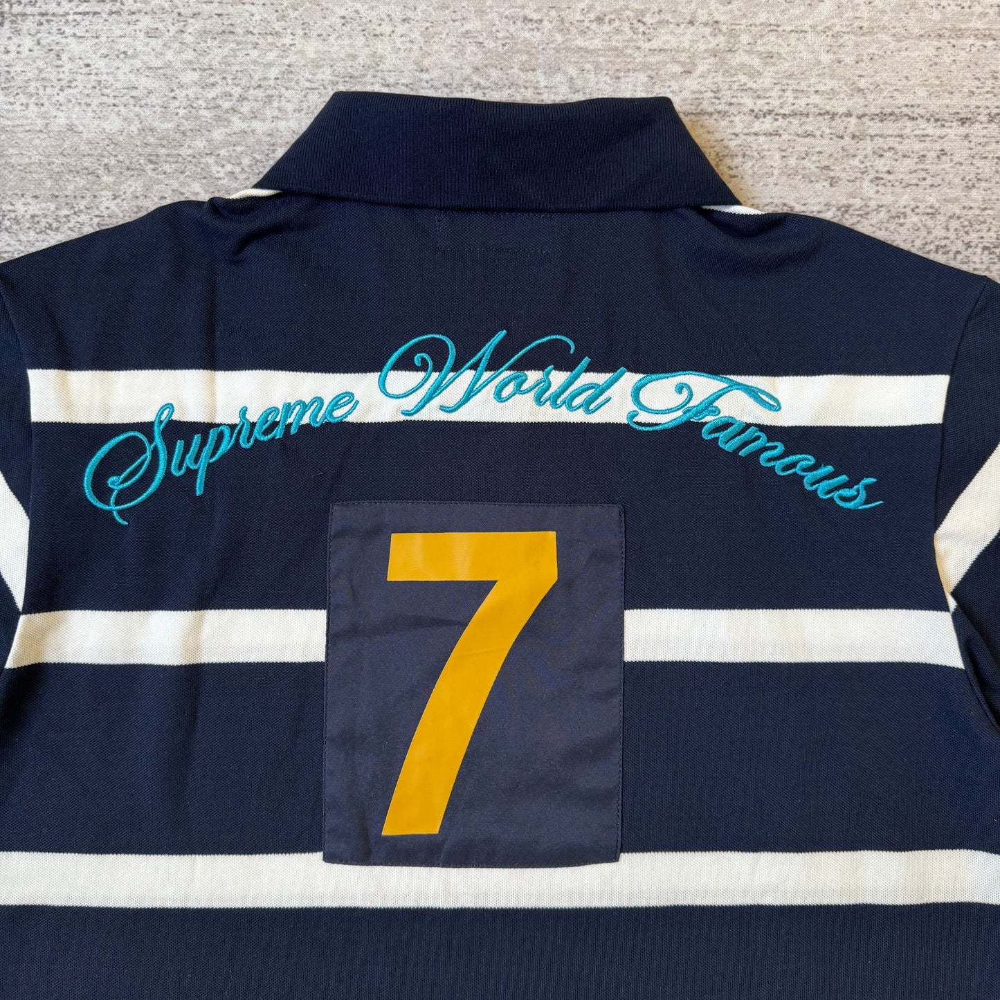 Supreme Cursive Polo 'Navy Stripe'