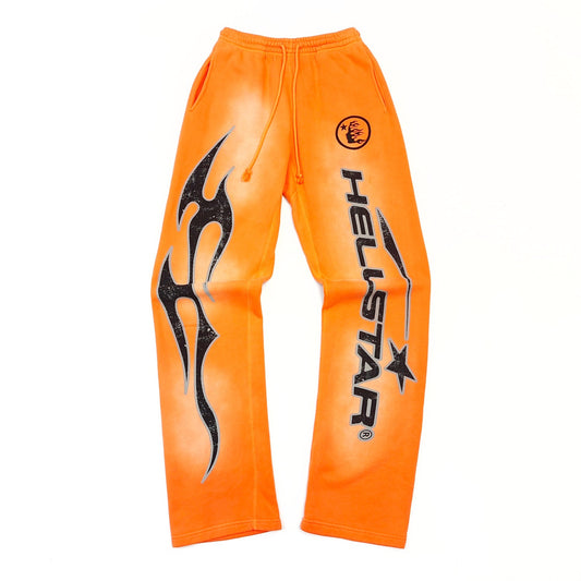 Hellstar Studios fire orange sweatpants